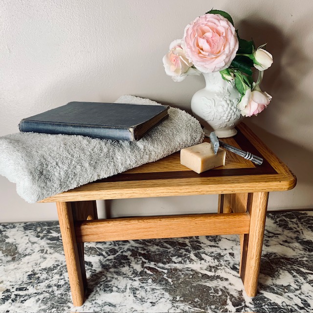how to use a vintage foot stool in the bathroom